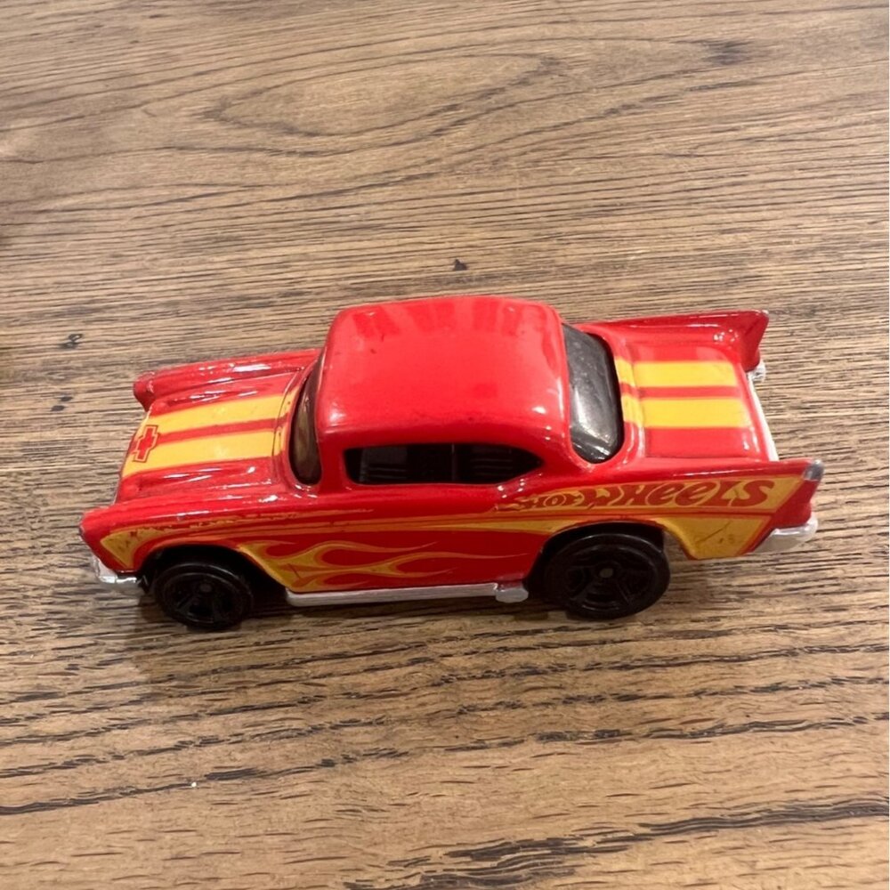 2012 Hot Wheels Showroom 1957 CHEVY Red Yellow Flames 76' Reproduction